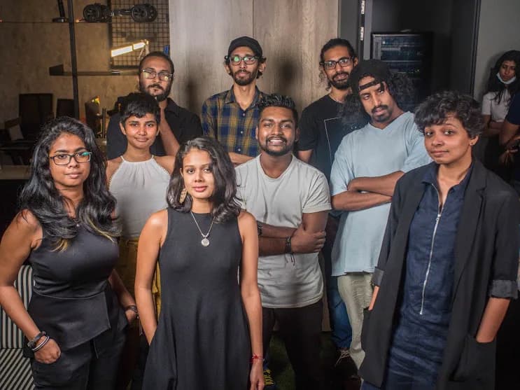 A group portrait of the Motion Miracles team