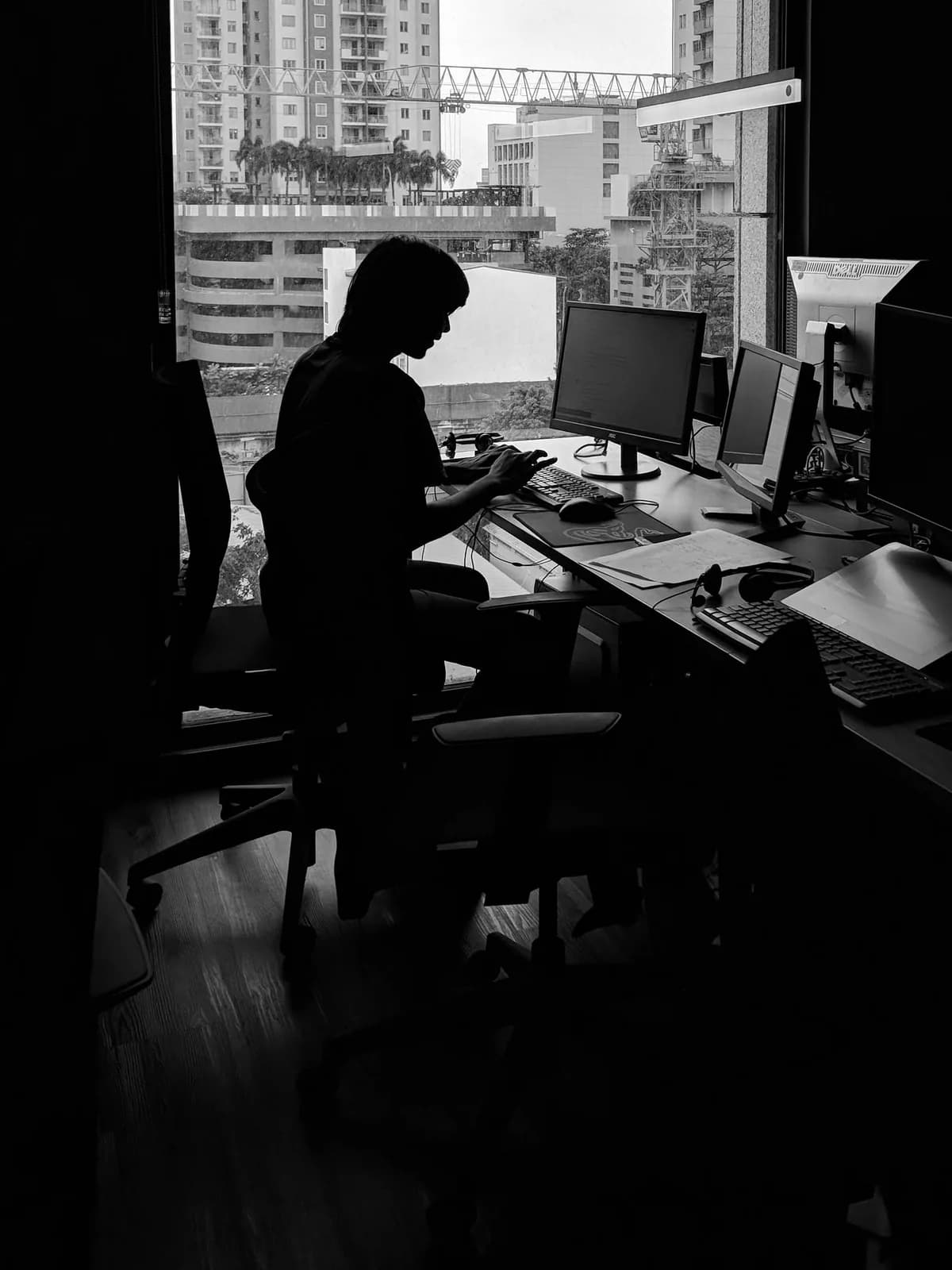 A developer working beside the studio windows