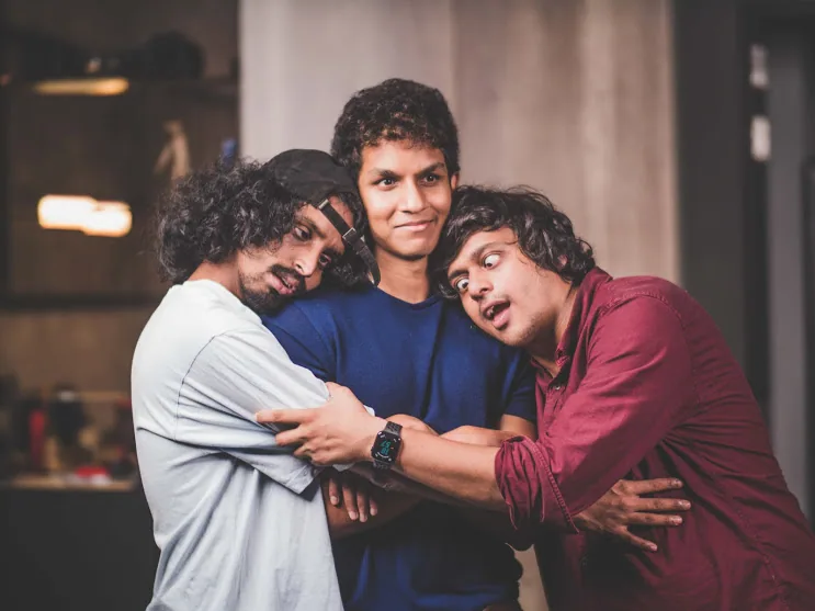 Colleagues having fun together at the studio