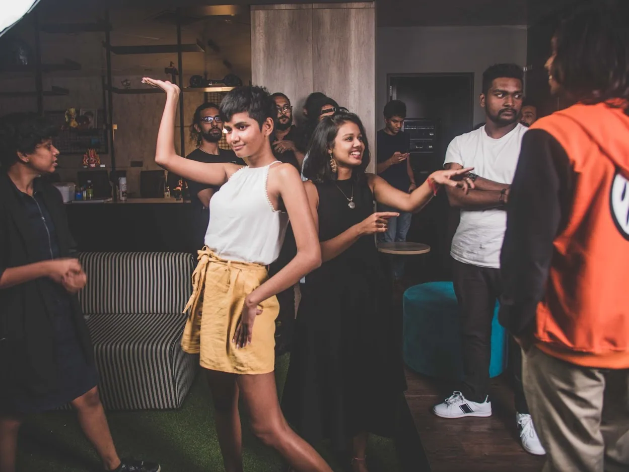 Team members spending time together at a studio event