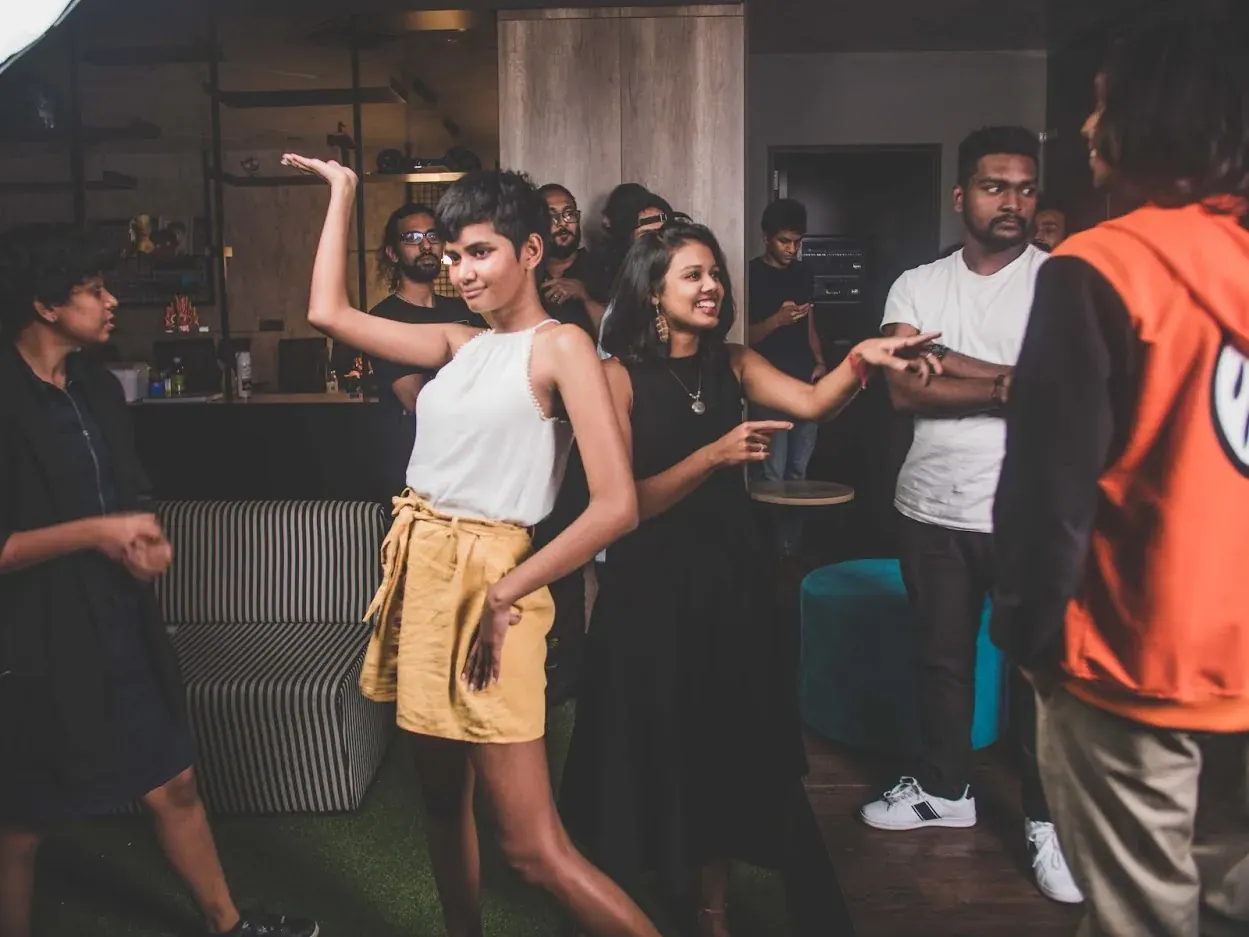 Team members spending time together at a studio event
