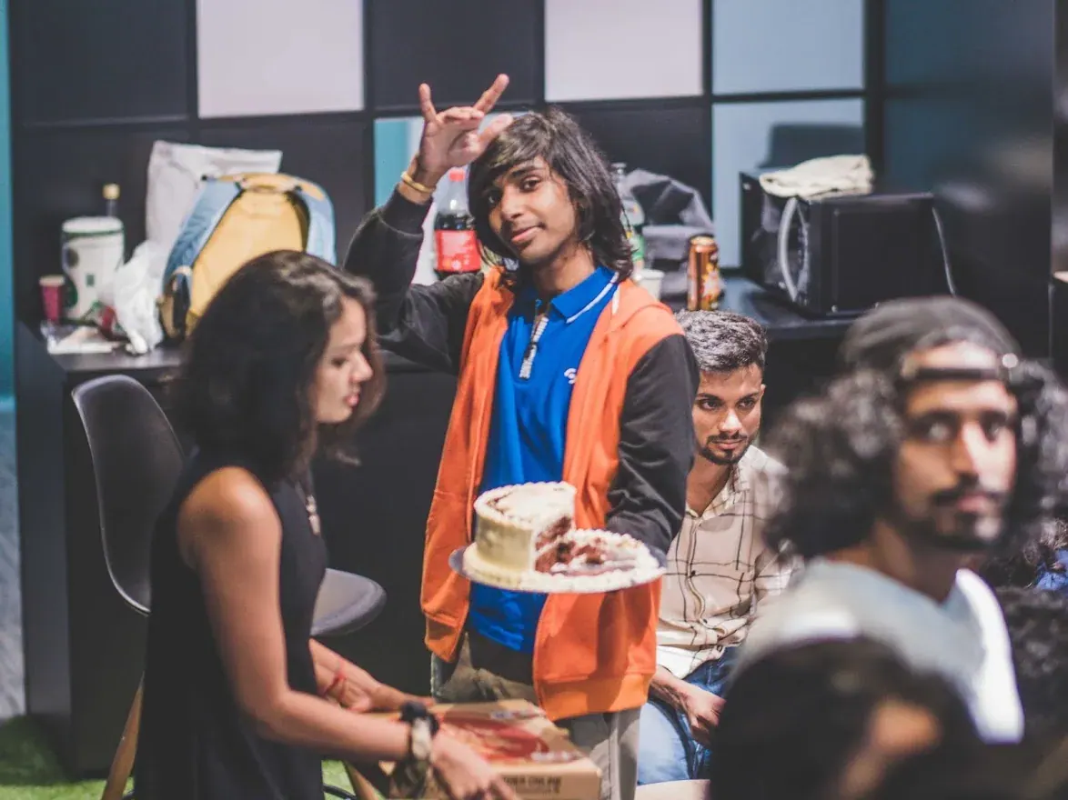 A team member at a shared studio celebration